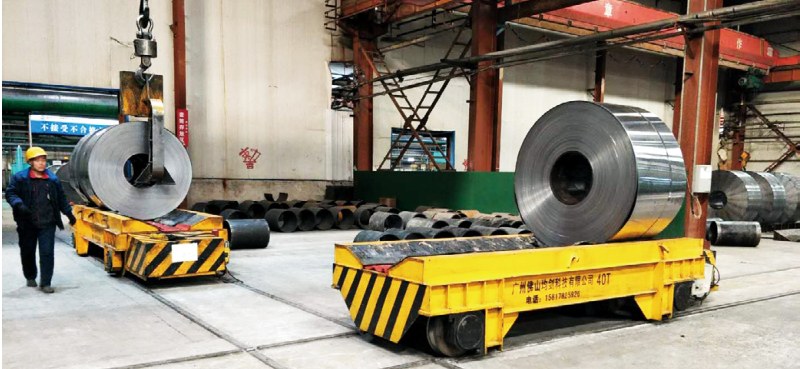 Battery transfer cart and rail-guided flatbed